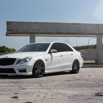 White Mercedes E Class with Custom Projector Headlights - Photo by Vossen