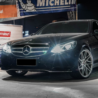 Black Mercedes E Class with Custom LED Headlights - Photo by Vossen