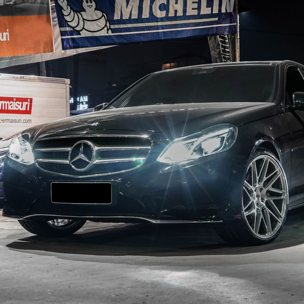 Black Mercedes E Class with Custom LED Headlights - Photo by Vossen