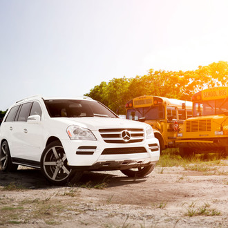 White Mercedes GL with Custom Bumper Guard - Photo by Vossen