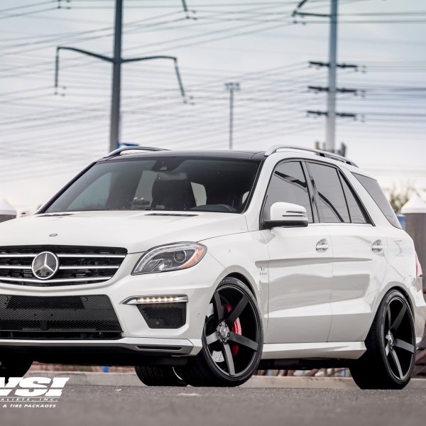 White Mercedes M Class with Custom Headlights - Photo by Vossen