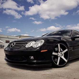 Carbon Fiber Front Lip on Black Mercedes SL - Photo by Vossen