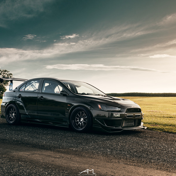Custom Black Stanced Mitsubishi Evolution - Photo by Arlen Liverman