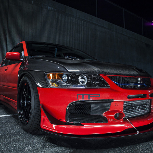 Carbon Fiber Hood on Red Mitsubishi Evolution - Photo by Manuel Veron