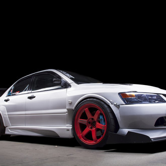 Custom Front Bumper Lip Spoiler on White Mitsubishi Evolution - Photo by Manuel Veron