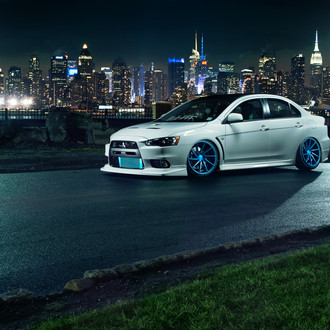 Custom Body Kit on White Mitsubishi Evolution - Photo by Vossen