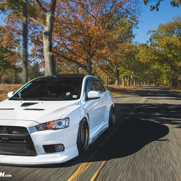 White Stanced Mitsubishi Evolution with Custom Front Lip - Photo by Avant Garde Wheels