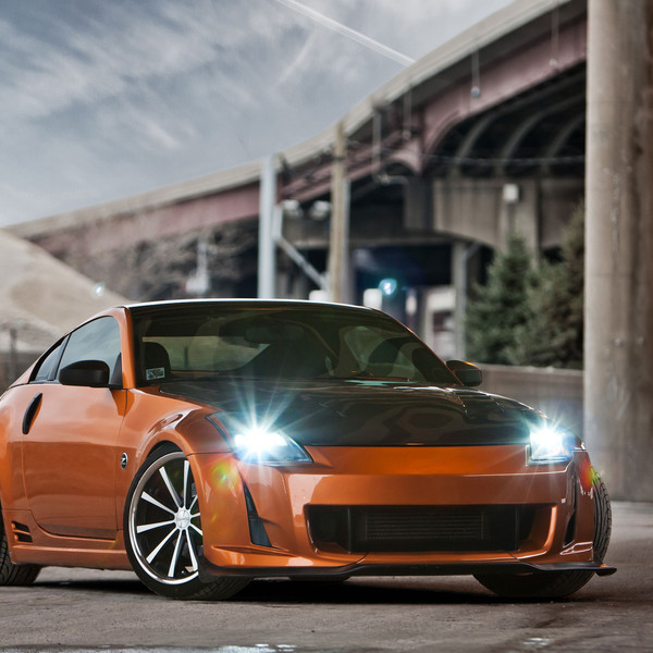 Custom Orange Nissan 350Z with Black Hood - Photo by Vossen