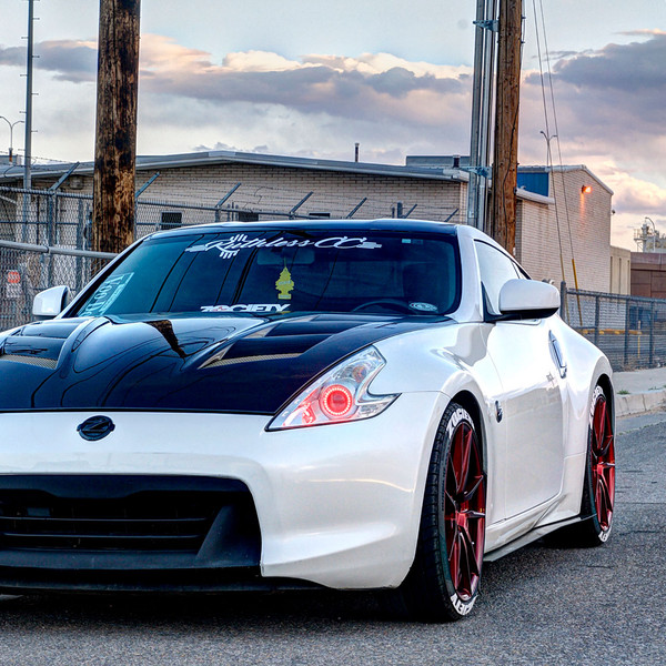 Rohana RF2 Candy Red Rims on a White Nissan 370Z - Photo by Rohana Wheels
