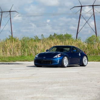 Blue Nissan 370Z with Aftermarket LED Headlights - Photo by Vossen