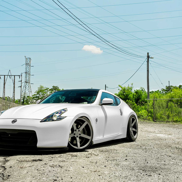 White Stanced Nissan 370Z with Custom Front Lip - Photo by Vossen