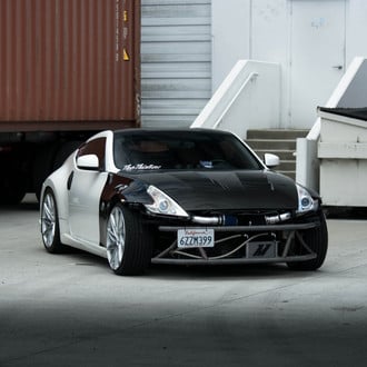 White Nissan 370Z with Custom Body Kit - Photo by Ace Alloy