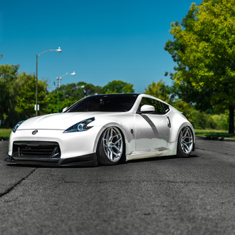 White Lowered Nissan 370Z with Custom Halo Headlights - Photo by Rohana Wheels