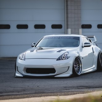 Rohana RF2 Candy Red Rims on a White Nissan 370Z — CARiD.com Gallery