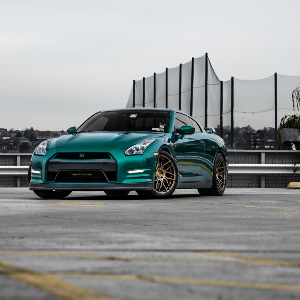 Green Nissan GT-R with Aftermarket Headlights - Photo by Rohana Wheels