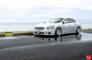 Tuning Kit on Silver Nissan Maxima Featuring Chrome Elements