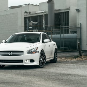 Attractive White Nissan Maxima Wearing Custom Forged Vossen Wheels