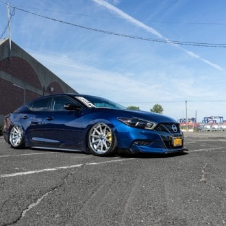 Blue Stanced Nissan Maxima with Custom Mesh Grille - Photo by Rohana Wheels