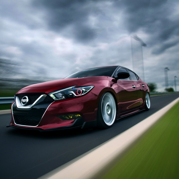 Air Lifted Nissan Maxima With Dual Exhaust and Front Bumper Lip - Photo by Vossen