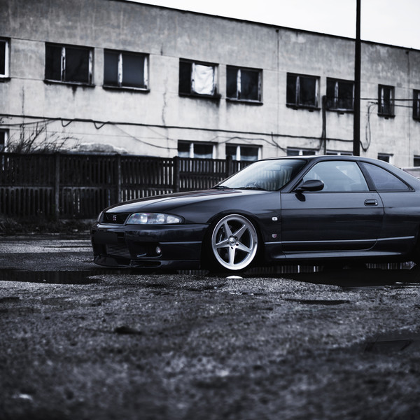 Black Nissan Skyline with Aftermarket Front Lip - Photo by JR Wheels