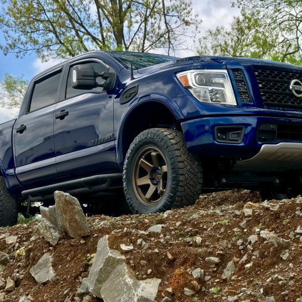 Blue Nissan Titan V8 with Blacked Out Mesh Grille - Photo by Black Rhino Wheels