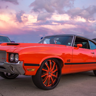 Red Oldsmobile Cutlass with Chrome Front Bumper - Photo by Forgiato