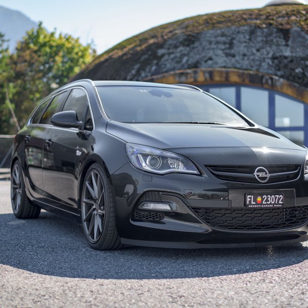 Black Opel Astra with Custom Front Bumper - Photo by Vossen