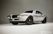 Silver Pontiac Firebird Showing Off Goodyear Eagle Tires