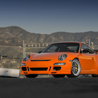 Customized Orange Porsche 911 Wearing Custom Polished ADV1 Wheels Wrapped in Michelin Tires