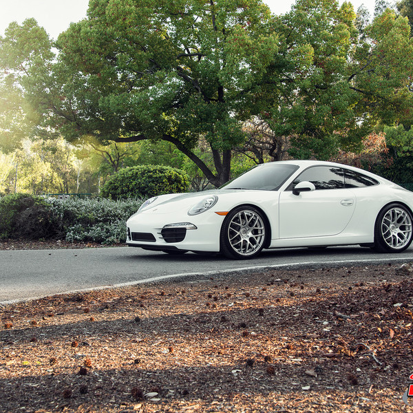 White Porsche 911 with Crystal Clear Custom Headlights - Photo by Avant Garde Wheels