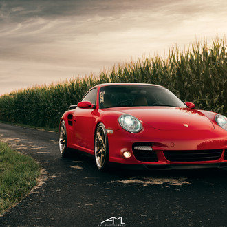 Crystal Clear Halo Headlights on Red Porsche 911 - Photo by Arlen Liverman