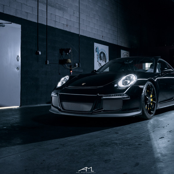 Aftermarket Front Bumper on Black Porsche 911 - Photo by Arlen Liverman