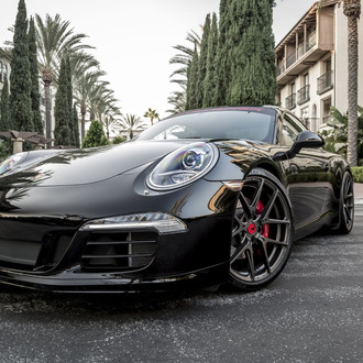 Out of the darkness: Customized Black Porsche 911