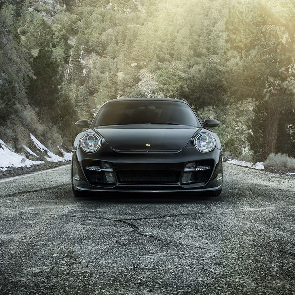 Black Porsche 911 with Aftermarket Front Lip - Photo by Vorstiner