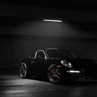 Black Porsche 911 with Dark Smoke Headlights - Photo by Vorstiner