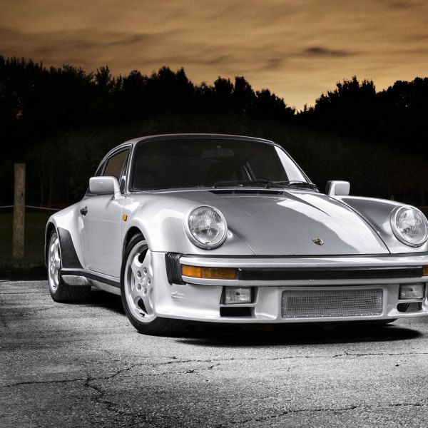 Gray Porsche 911 with Aftermarket Front Bumper - Photo by dan kinzie