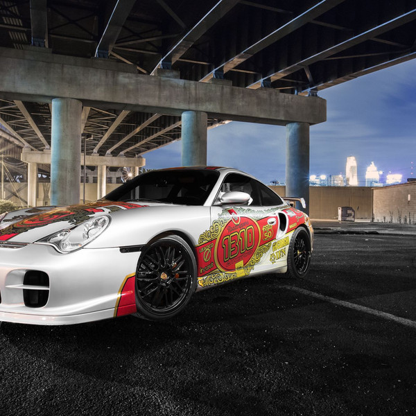 Custom White Debadged Porsche 911 - Photo by dan kinzie