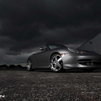 Gray Metallic Porsche 911 with Aftermarket Headlights - Photo by Vossen
