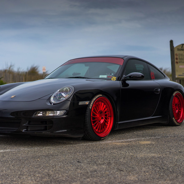 Custom Black Porsche 911 Carrera with Red Accents - Photo by Rotiform