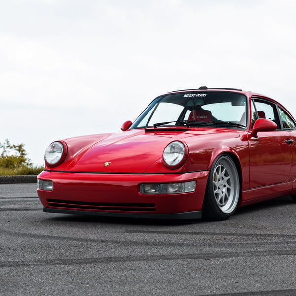 Red Porsche 911 with Aftermarket Front Lip - Photo by Rotiform