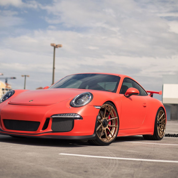 Aftermarket Headlights on Matte Red Porsche 911 - Photo by ADV.1