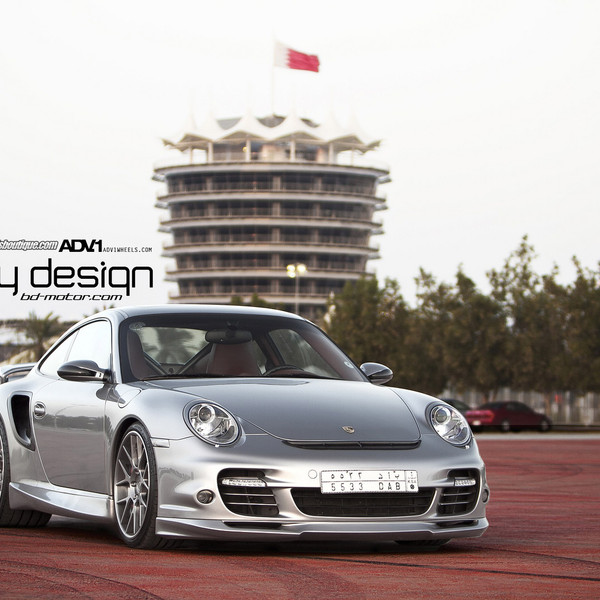 Silver Porsche 911 with Aftermarket Headlights - Photo by ADV.1