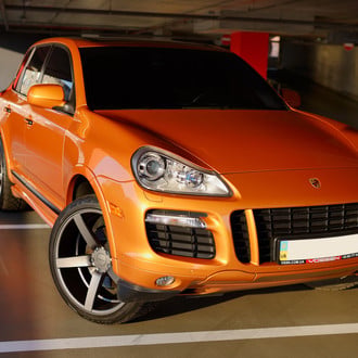 Orange Porsche Cayenne with Custom LED Headlights - Photo by Vossen