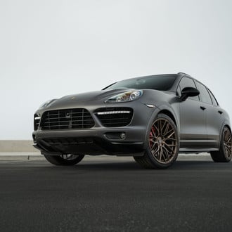 Out of the Darkness: Black Matte Porsche Cayenne with Custom Headlights