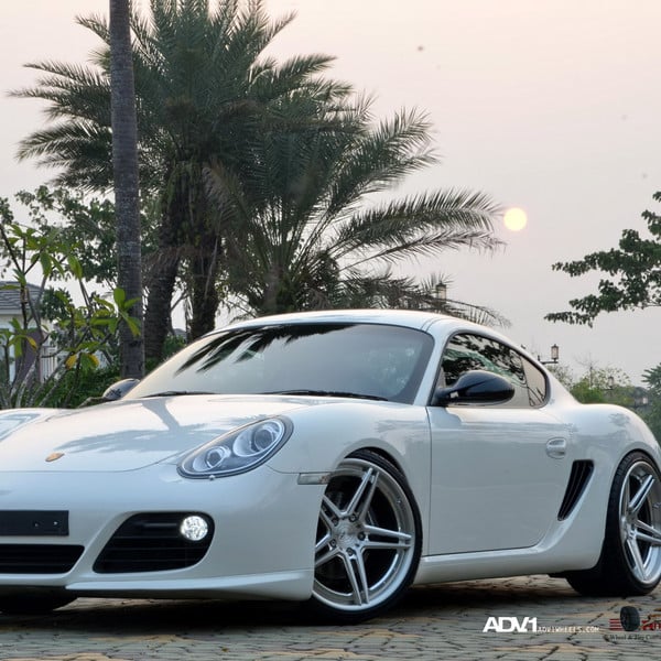 White Porsche Cayman with Custom Halo Headlights - Photo by ADV.1