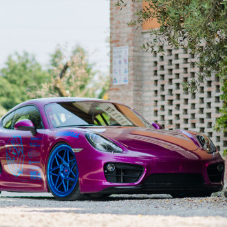 Purple Porsche Cayman is a Show Stopper on Custom Painted Blue Vossen Wheels