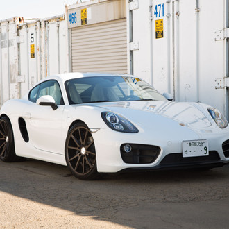 White Porsche Cayman with Custom Headlights - Photo by Vossen