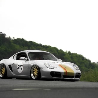 Silver Slammed Porsche Cayman Front Lip - Photo by Rotiform