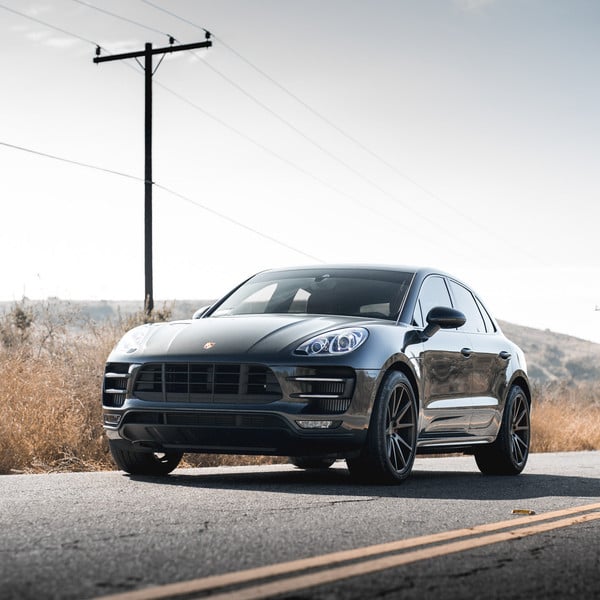 Custom Halo Headlights on Black Porsche Macan - Photo by Vossen