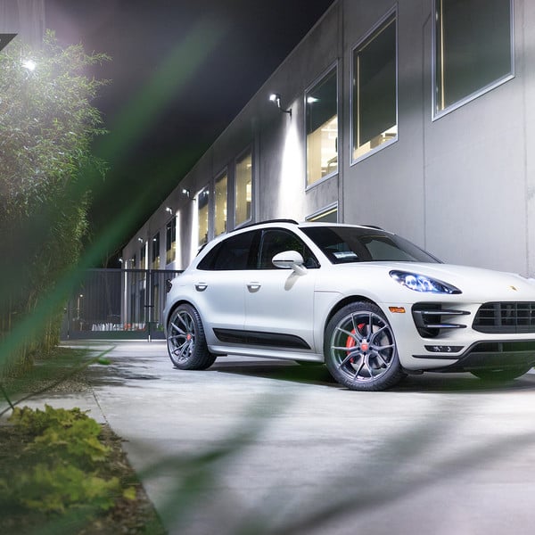 White Porsche Macan with Custom Projector Headlights - Photo by Vorstiner